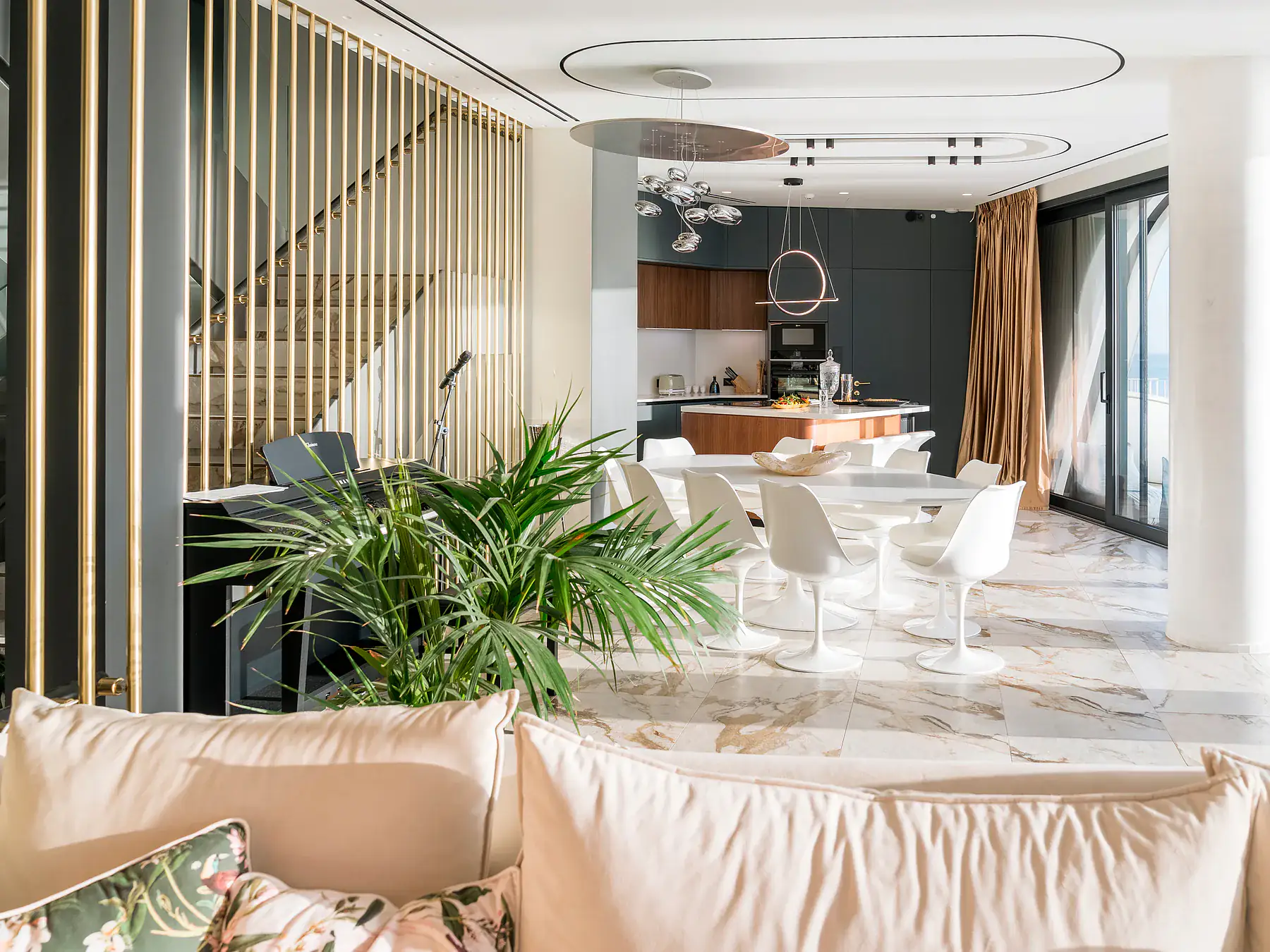 Luxurious living space blending natural tones, marble, and soft sunlight.